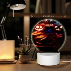 Round Acrylic Night Light, Three Pumpkins With Faces Carved Into Them Are Sitting On A Table. -Cute Night Light Shop 0153597955738c08c9a5c50e1ea50fe82a0bf89b