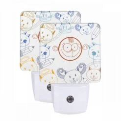 Night Light Set Of 2, A Collection Of Cartoon Cats With Pencils In Their Mouths.