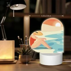 Love Acrylic Night Light, A Woman Wearing A Hat Sits On The Beach. -Cute Night Light Shop 111d43a8fa682607051540b88f47515da4ca543c