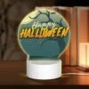 Round Acrylic Night Light, A Tree With A Spooky Halloween Sign On It.