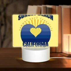 Rectangular Acrylic Night Light, A Yellow And Blue Logo For Sunset Beach California.