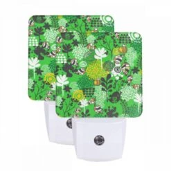 Night Light Set Of 2, A Green And Yellow Floral Pattern With Bees And Flowers.