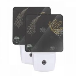 Night Light Set Of 2, A Collection Of Leaves And Flowers On A Black Background.
