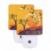 Night Light Set Of 2, A Poster Of Bats Flying Around A Tree With The Words "Trick Or Treat" Written On It. -Cute Night Light Shop 1c67bd7458c84ccb71d48a3262e4016884e9d513