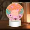 Round Acrylic Night Light, A Woman With Red Hair Is Surrounded By Flowers. -Cute Night Light Shop 2b0244ebde5513c4d059f9bc75ee2a12444255f2