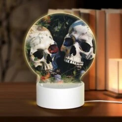 Round Acrylic Night Light, Two Skulls Are Sitting In The Grass