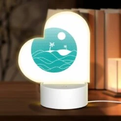 Front Page 39 Love Acrylic Night Light, A Blue And White Circle With A Beach And Palm Trees In It.