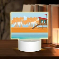 Rectangular Acrylic Night Light, A Small Hut Is Situated On A Sandy Beach.