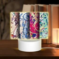 Rectangular Acrylic Night Light, Four Different Colored Paintings Of Flowers.