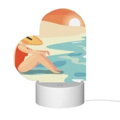 Love Acrylic Night Light, A Woman Wearing A Hat Sits On The Beach. -Cute Night Light Shop 3eee7bc3a1230c0a96f303d7fc1cddf5da418044