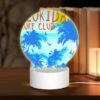 Round Acrylic Night Light, A Colorful Surf Club Poster With A Blue And Orange Background. -Cute Night Light Shop 4014963cf93da2d8cc085131e6fe1396247c450e