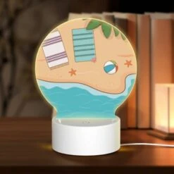 Round Acrylic Night Light, A Beach Scene With A Towel