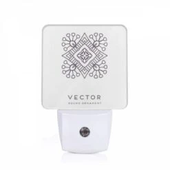 Night Light, A Round Ornament With A Design On It.