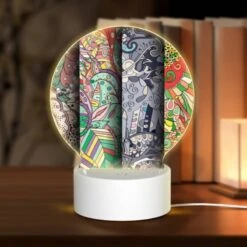 Round Acrylic Night Light, Four Different Colored And Patterned Designs Of A Bird.