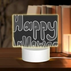 Rectangular Acrylic Night Light, A Black And White Sign That Says "Happy Halloween".
