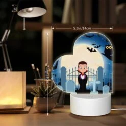 Love Acrylic Night Light, A Boy In A Vampire Costume Stands In Front Of A Fence With A Cemetery In The Background. -Cute Night Light Shop 59315428721a6f881c271318b3ed91f68aeca981