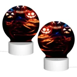 Round Acrylic Night Light, Three Pumpkins With Faces Carved Into Them Are Sitting On A Table. -Cute Night Light Shop 5a5e88ad589174015a657758162ad3603c1cd12d