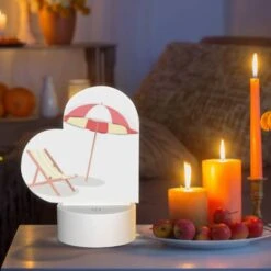 Love Acrylic Night Light, A Colorful Umbrella Is Open And Placed Over A Striped Lounge Chair. 8 Love Acrylic Night Light, A Colorful Umbrella Is Open And Placed Over A Striped Lounge Chair. -Cute Night Light Shop 5a8ae3eb5d618952db3ca6a62efdba147fa3456f