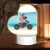 Love Acrylic Night Light, A Woman Is Sitting On A Motorcycle With A Surfboard On The Back. -Cute Night Light Shop 5c26e664b50a8fd0147b4018e423507d0985625d