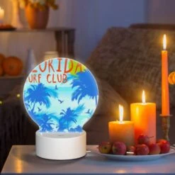 Round Acrylic Night Light, A Colorful Surf Club Poster With A Blue And Orange Background. -Cute Night Light Shop 5fa6742c4ac81faebf511b01d8c90db50e56ea8f