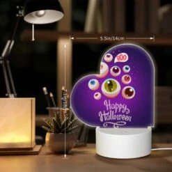 Love Acrylic Night Light, A Purple Background With A Happy Halloween Sign And A Bunch Of Eyes. -Cute Night Light Shop 67b9323ac8221d93c525b4d7cd4d15c991d37946