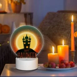 Round Acrylic Night Light, A Halloween Poster With A Castle And The Words "Happy Halloween" Written On It. -Cute Night Light Shop 69f1c3c8f5b8933aaeea6a00765f58607af6dfb2