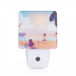 Night Light, A Family Is Enjoying A Day At The Beach