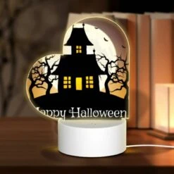 Front Page 7 Love Acrylic Night Light, A Halloween Poster With A Haunted House And Bats.