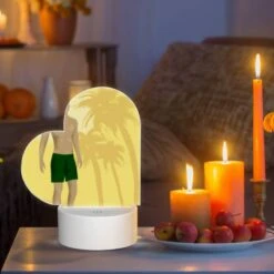 Love Acrylic Night Light, A Man Is Standing In Front Of A Sunset With A Green Pair Of Shorts On. -Cute Night Light Shop 75a9057bd374121f1327433e06b50baca6a136bd