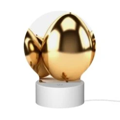 Round Acrylic Night Light, A Group Of Gold Eggs Are Sitting On A White Background. -Cute Night Light Shop 787138506a6ad073e2a8f5692a4d1ec7ffa9a879