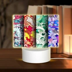 Rectangular Acrylic Night Light, Four Different Colored Designs Of A Clock.
