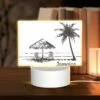 Rectangular Acrylic Night Light, A Black And White Drawing Of A Beach With A Palm Tree And Two Chairs.
