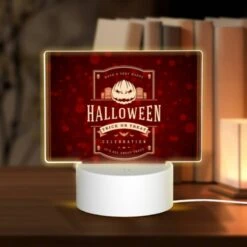 Rectangular Acrylic Night Light, A Red And White Halloween Poster With A Pumpkin On It.