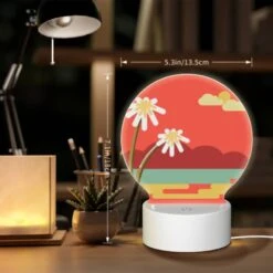 Round Acrylic Night Light, A Red And Yellow Sunset With Two White Flowers. -Cute Night Light Shop 97e98c9dbbde7ad41f7112de820117f549935840