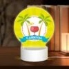 Round Acrylic Night Light, A Yellow Background With A Logo For Carnival. -Cute Night Light Shop 9c4105bb1b0cf478adbb0da3ea83abec3f3aa7f7
