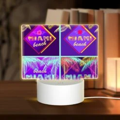 Rectangular Acrylic Night Light, Four Different Colored Images Of Palm Trees And The Word "Miami Beach" On Them.