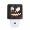 Night Light, A Carved Pumpkin With A Face And A Light Inside.
