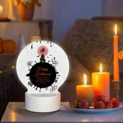 Round Acrylic Night Light, A Black And White Poster With A Witch On A Broomstick And The Words "Happy Halloween" Written In Orange. -Cute Night Light Shop a3fa97a5b4c752095059d9b3c0c565e944b0f81f