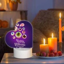 Love Acrylic Night Light, A Purple Background With A Happy Halloween Sign And A Bunch Of Eyes. -Cute Night Light Shop a914373c1b65e850a5b9d4bc26e1acc4a6428adb