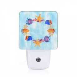 Night Light, A Colorful Painting Of Fish And A Starfish.