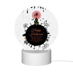 Round Acrylic Night Light, A Black And White Poster With A Witch On A Broomstick And The Words "Happy Halloween" Written In Orange. -Cute Night Light Shop b160a7833c05a080aa69ec31bf261664c5ecb557