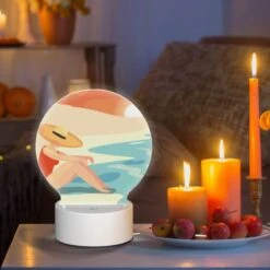 Round Acrylic Night Light, A Woman Wearing A Hat Sits On The Beach. 8 Round Acrylic Night Light, A Woman Wearing A Hat Sits On The Beach. -Cute Night Light Shop b620ee33517a59fb7a6c8ac7b3968786f26f7194