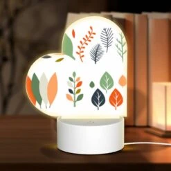 Love Acrylic Night Light, A Collection Of Leaves In Different Colors.