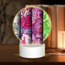 Round Acrylic Night Light, Three Colorful Designs Are Displayed On A Row.