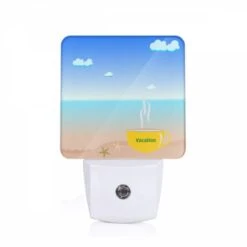 Night Light, A Cup Of Coffee With A Beach Scene In The Background.
