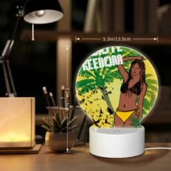 Round Acrylic Night Light, A Woman With A Yellow Bikini Is Standing In Front Of A Tree With Birds Flying Around Her. -Cute Night Light Shop c4bd762dc82a03e01e80be3e7a2583eb5533191f