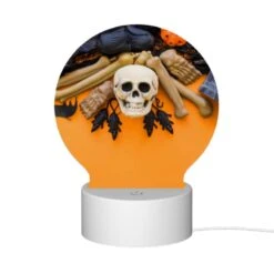 Round Acrylic Night Light, A Skeleton And A Skull Are On A Table With A Bat And A Book. -Cute Night Light Shop c6359b0e32ea1d48cf6426797e58805405f14dd9