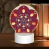 Round Acrylic Night Light, A Colorful Flower Design With A Yellow Center.