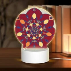 Round Acrylic Night Light, A Colorful Flower Design With A Yellow Center.