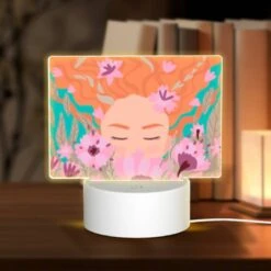 Rectangular Acrylic Night Light, A Woman With Red Hair Is Surrounded By Flowers.